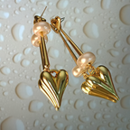 Dangling Golden Heart Statement Earrings With Bead
