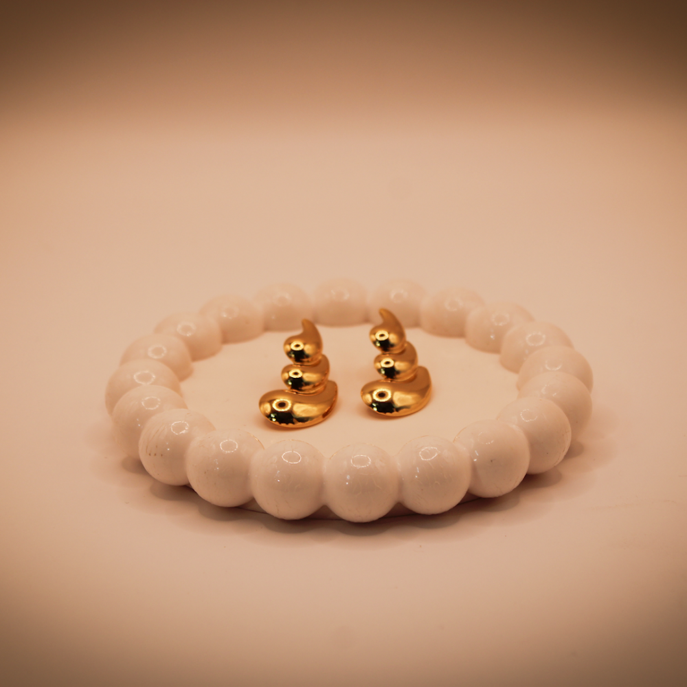 Stacked Golden Drops Statements Earrings