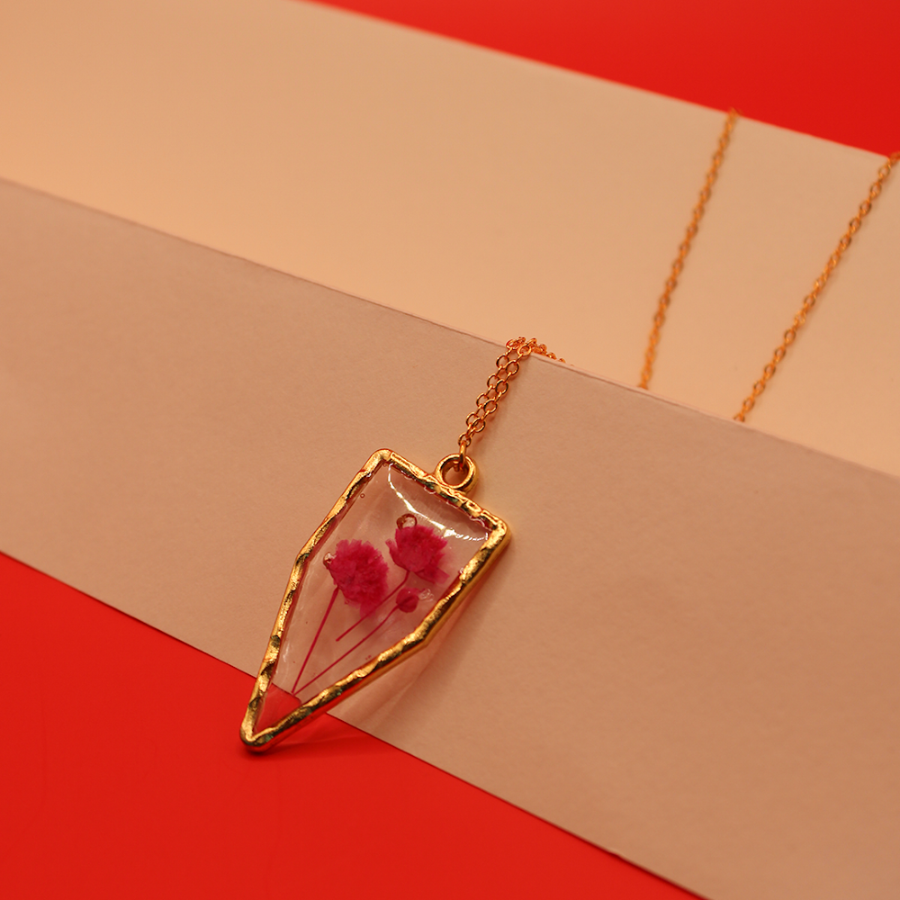 Resin Pink Flora Arrowhead Pendant