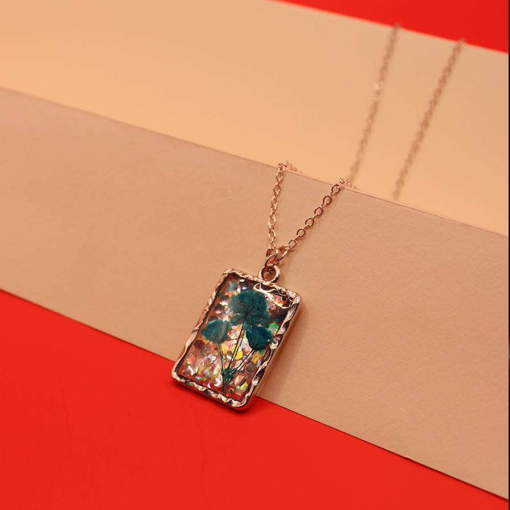 Teal Flora Sparkle Resin Pendant