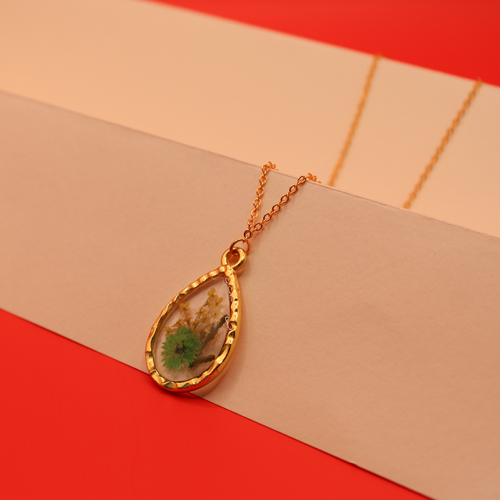 Encased Emerald Bloom Teardrop resin Pendant
