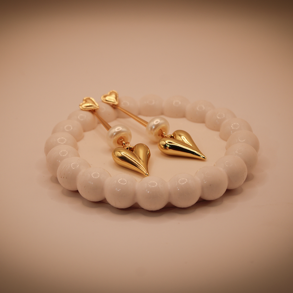 Dangling Golden Heart Statement Earrings With Bead
