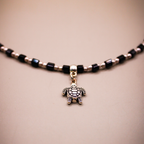 Dangling Tortoise Charm Silver-Black Beaded Anklets