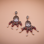 Mantra Engraved Oxidized Jhumka Earrings With Red Beads