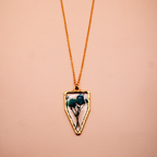 Resin Teal Flora Arrowhead Pendant