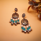 Mantra Engraved Oxidized Jhumka Earrings With White-Blue Beads