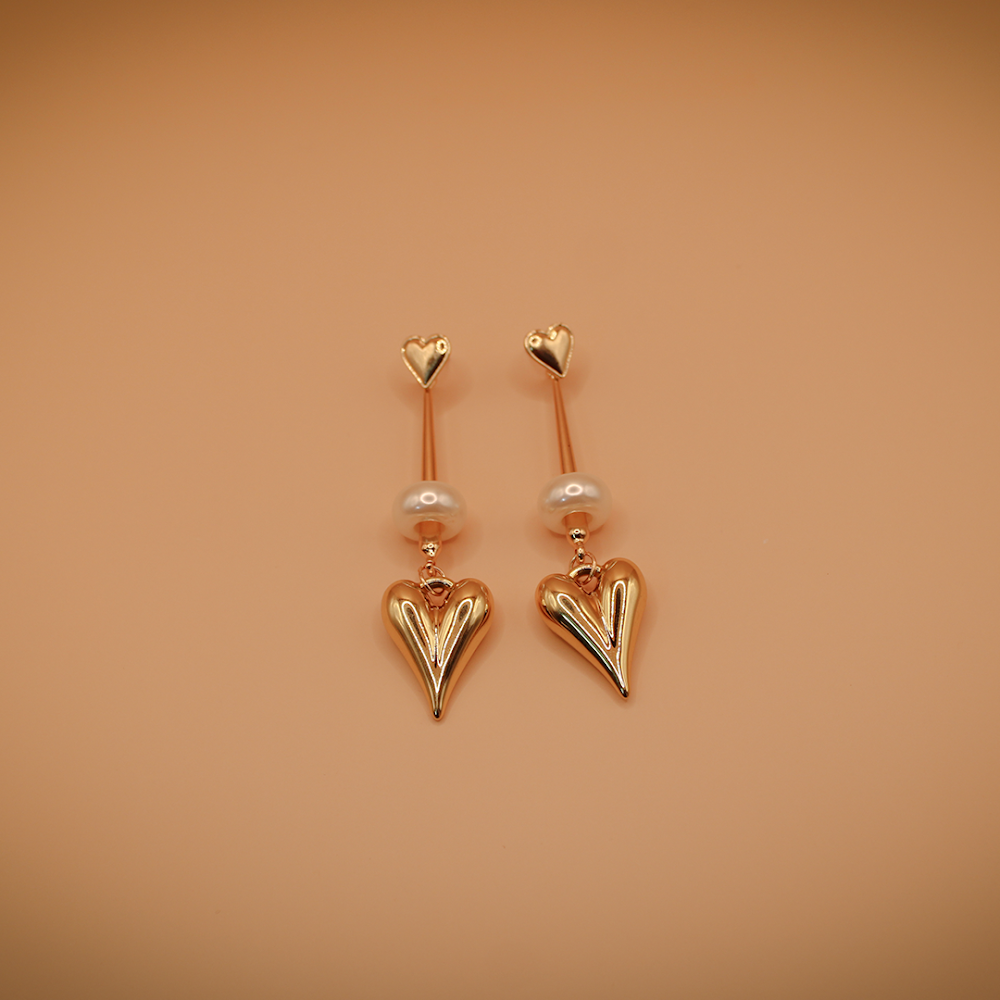 Dangling Golden Heart Statement Earrings With Bead
