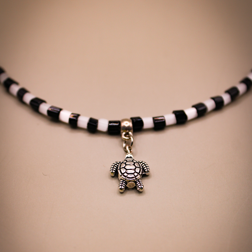 Dangling Tortoise Charm Black-White Beaded Anklets