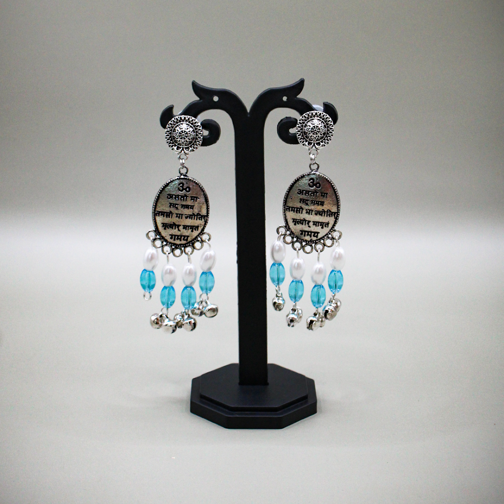 Mantra Engraved Oxidized Jhumka Earrings With White-Blue Beads