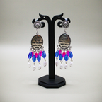 Mantra Engraved Oxidized Jhumka Earrings With Pink-Blue Beads
