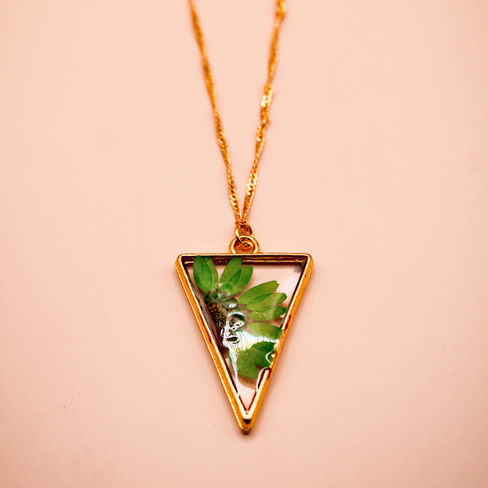 Encased Emerald Flower Trianglular  resin Pendant