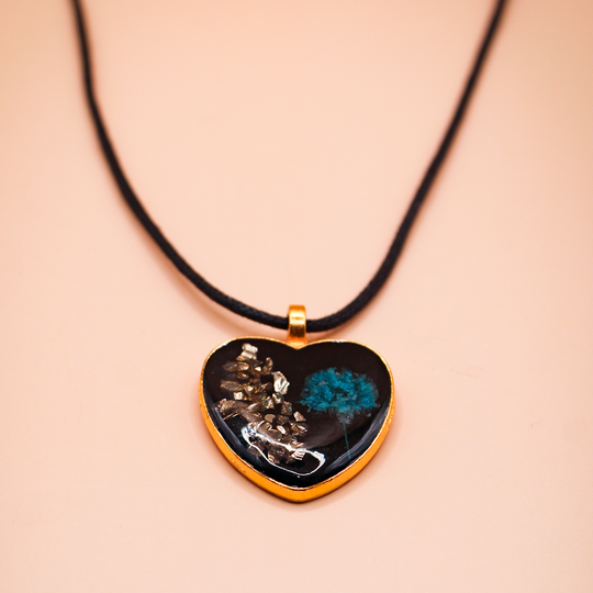 Black Abyss Teal Spark Resin Heart Pendant