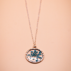 Encased Ocean Bloom Circular resin Pendant