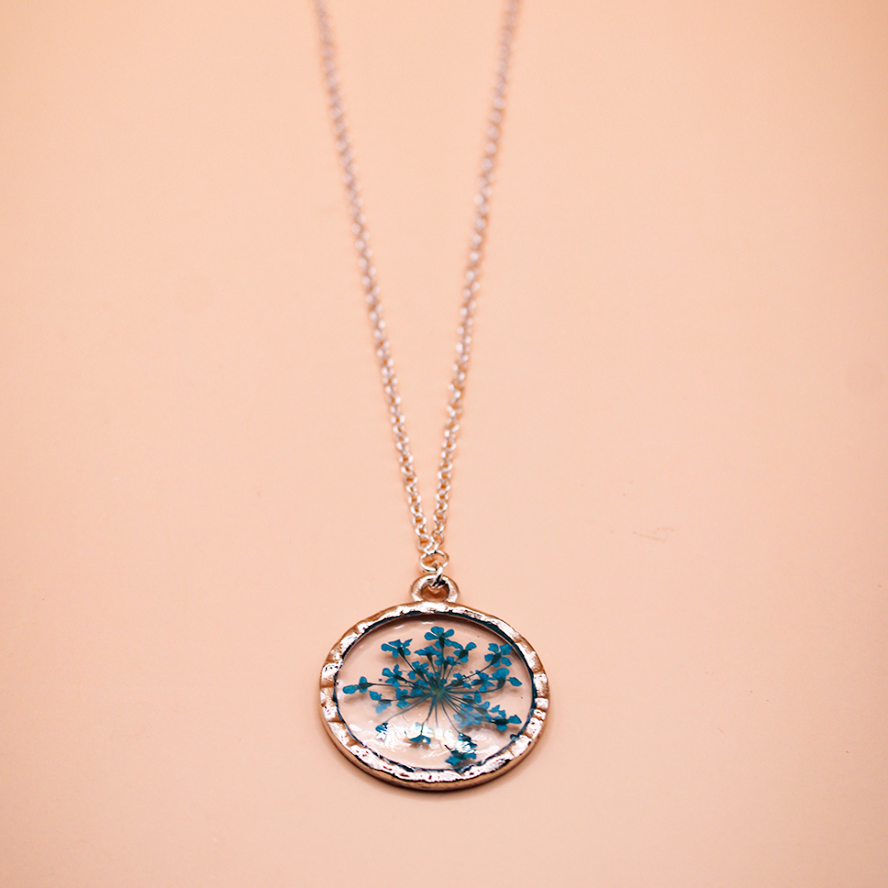 Encased Ocean Bloom Circular resin Pendant